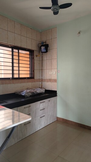 Kitchen in 2 BHK Apartment at Magarpatta City Iris, Hadapsar – for Sale