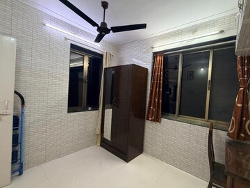 Room in 2 BHK Apartment at Malad West – for Rent