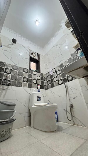 Bathroom in 2 BHK Builder Floor at Chattarpur – for Rent