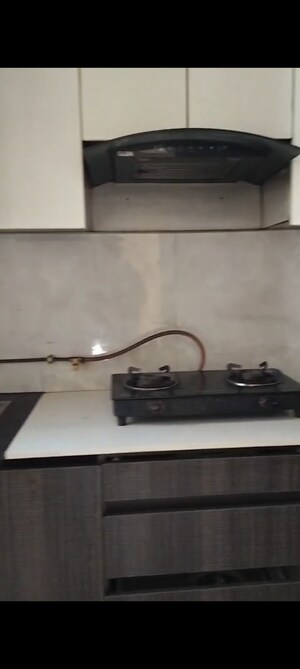 Kitchen in 2.5 BHK Apartment at Mahagun Mywoods, Sector 16c Greater Noida – for Rent