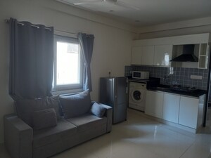 Living Room in 1 BHK Apartment at Halasuru – for Rent