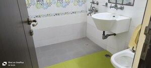 Bathroom in 4 BHK Apartment at Sector 18a Dwarka – for Rent