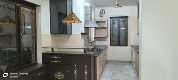 Kitchen in 4 BHK Apartment at Sector 18a Dwarka – for Rent