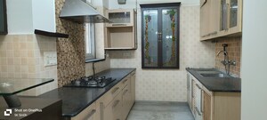 Kitchen in 4 BHK Apartment at Sector 18a Dwarka – for Rent