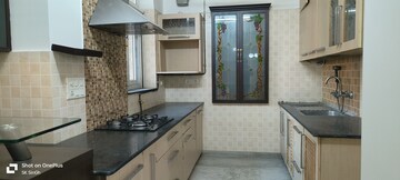 Kitchen in 4 BHK Apartment at Sector 18a Dwarka – for Rent