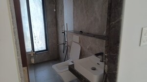 Bathroom in 3 BHK Apartment at Metro Saraswati Heights, Mulund West – for Rent