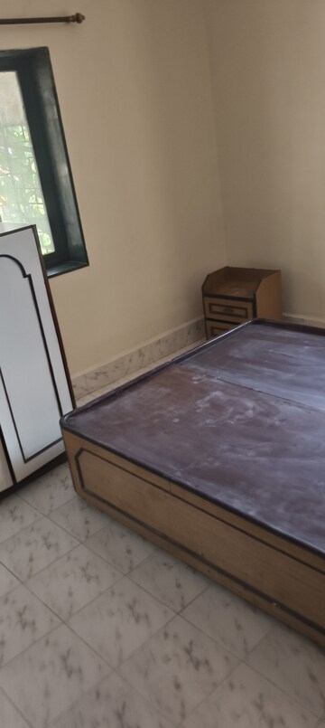 Room in 2 BHK Apartment at Sam Society, Naupada – for Rent