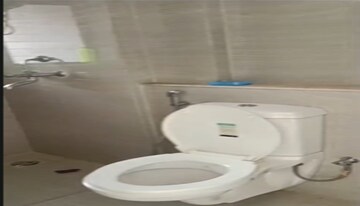 Bathroom in 1 BHK Apartment at Runwal Gardens, Dombivli East – for Rent