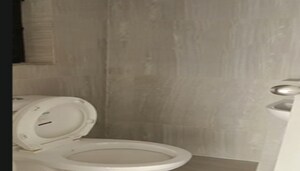 Bathroom in 1 BHK Apartment at Runwal Gardens, Dombivli East – for Rent