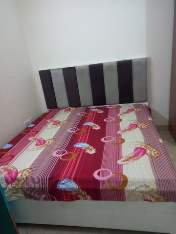 Bedroom in 2 BHK Apartment at JKG Palm Court, Sector 16c Greater Noida – for Rent