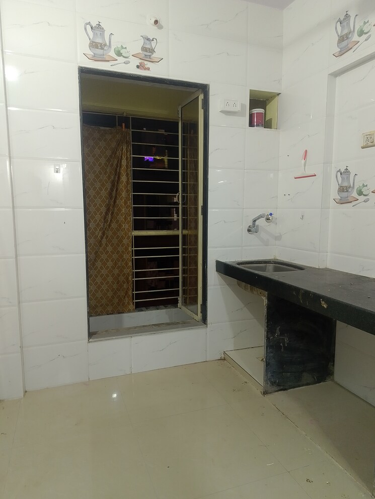 Kitchen, nine-sea-grapes 1 Bedroom 303 Sq.Ft. Apartment In Nalasopara West Palghar 9605640