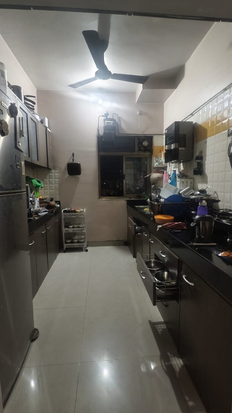 Kitchen, vijay-enclave 2.5 Bedroom 850 Sq.Ft. Apartment In Waghbil Thane 9605889