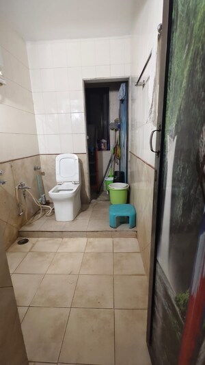 Bathroom in 2.5 BHK Apartment at Vijay Enclave, Waghbil – for Rent