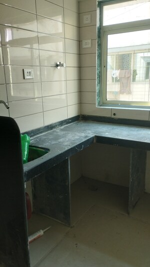 Kitchen in 1 BHK Apartment at Alfa Mana Residence, Mazgaon – for Sale