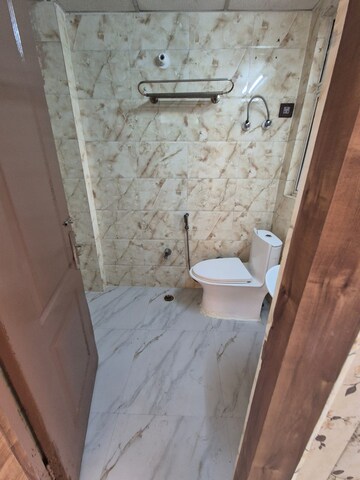 Bathroom in 2 BHK Apartment at Amrapali Princely Estate, Sector 76 – for Sale