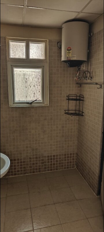 Bathroom in 3 BHK Apartment at Aditya Urban Casa, Sector 78 – for Rent