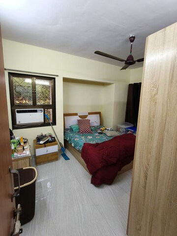 Bedroom in 1 BHK Apartment at Asmita Jyoti CHS, Malad West – for Rent