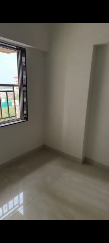 Living Room in 1 BHK Apartment at Naman Regency, Byculla – for Sale