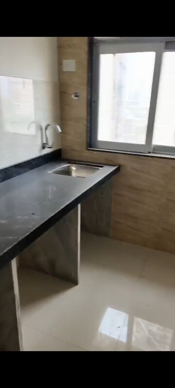 Kitchen in 1 BHK Apartment at Naman Regency, Byculla – for Sale