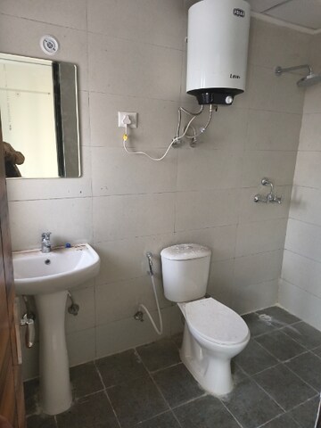 Bathroom in 3 BHK Apartment at Samridhi Luxuriya Avenue, Sector 150 – for Rent