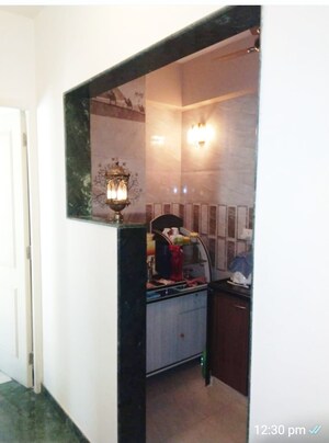 Kitchen in 1.5 BHK Apartment at Hiranandani Estate Crown, Ghodbunder Road – for Sale