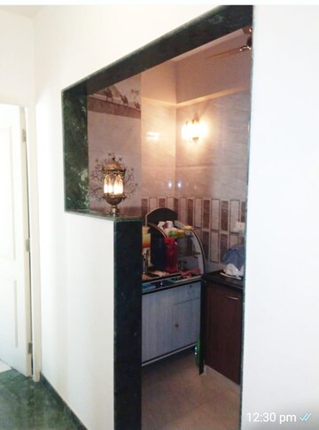 Kitchen in 1.5 BHK Apartment at Hiranandani Estate Crown, Ghodbunder Road – for Sale