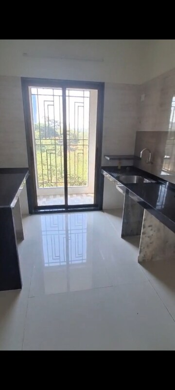 Kitchen in 1 BHK Apartment at Regency Onyx, Dombivli East – for Rent