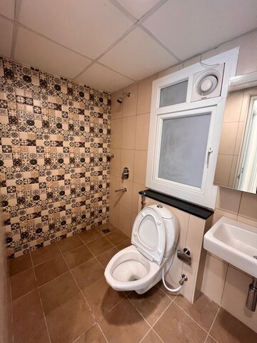 Bathroom in 2 BHK Apartment at Brigade Bricklane, Jakkuru – for Rent