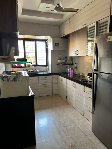 Kitchen in 1 BHK Apartment at Oshiwara Basera CHS, Andheri West – for Rent