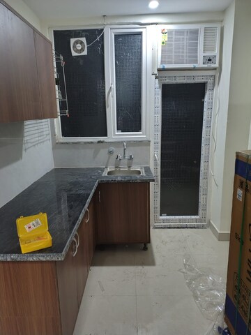Kitchen in 1 RK Penthouse at Unitech South City 1, South City 1 – for Rent