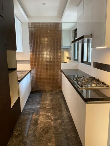Kitchen in 5 BHK Apartment at Lodha Trump Tower, Worli – for Rent