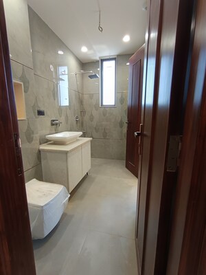 Bathroom in 4 BHK Builder Floor at Puri Aman Vilas, Sector 89 – for Sale