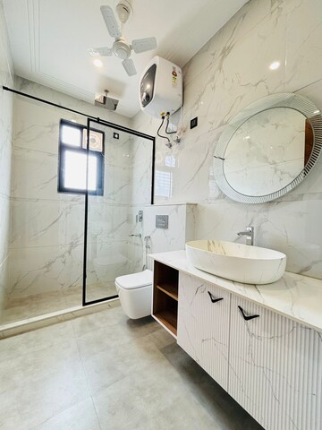 Bathroom in 3 BHK Builder Floor at Ansal API Esencia, Sector 67 – for Sale