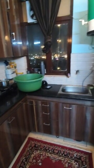 Kitchen in 1 BHK Apartment at Auric City Homes, Sector 82 – for Sale