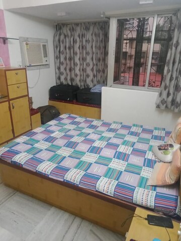 Bedroom in 3 BHK Apartment at Juhu Abhishek Chs Ltd, Andheri West – for Rent