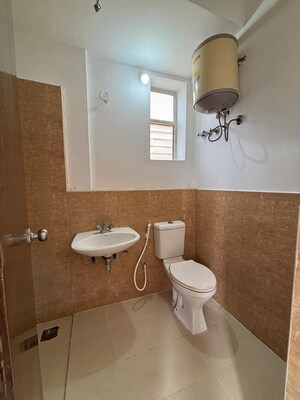 Bathroom in 3 BHK Apartment at DLF Woodland Heights My Town, Jigani – for Sale