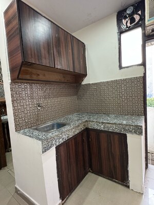 Kitchen in 1 RK Apartment at DLF City Phase III, Sector 24 – for Rent