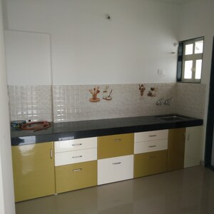 Kitchen in 2 BHK Apartment at Raj Heramba Venkatesh Imperia, Punawale – for Rent