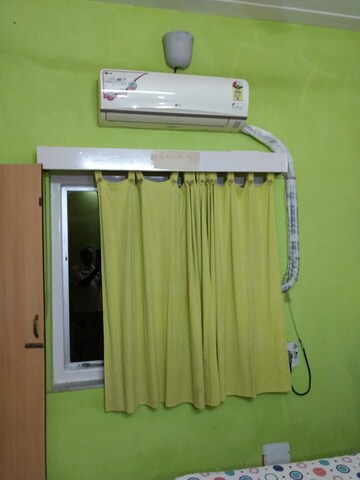 Bedroom in 2 BHK Apartment at Pushpa Vihar CHS, Colaba – for Rent