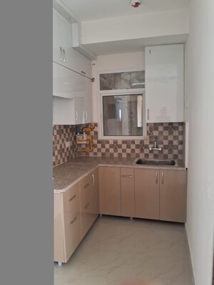 Kitchen in 2 BHK Apartment at Sector 10 Greater Noida – for Rent