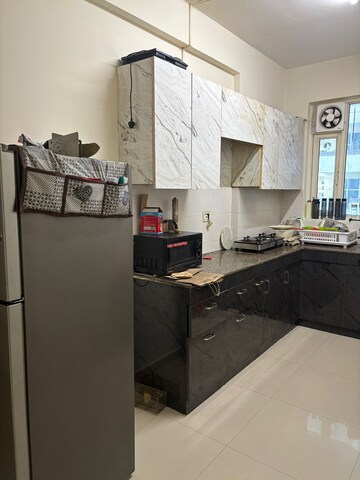 Kitchen in 2 BHK Apartment at Pyramid Urban Homes, Sector 70a – for Rent