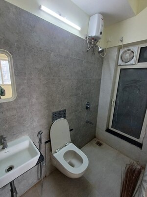 Bathroom in 1 BHK Apartment at Omkar Signet, Malad East – for Rent