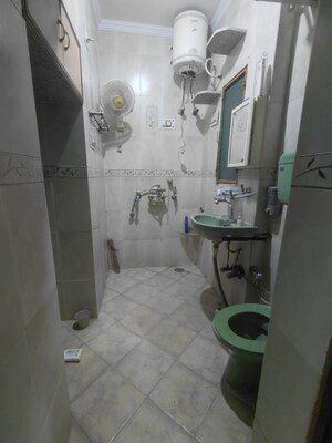 Bathroom in 3 BHK Apartment at Janakpuri – for Rent