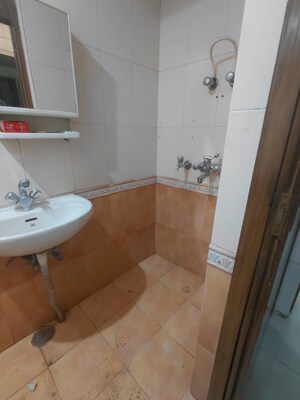 Bathroom in 3 BHK Apartment at Janakpuri – for Rent