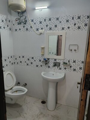 Bathroom in 3 BHK Builder Floor at Sainik Colony – for Rent