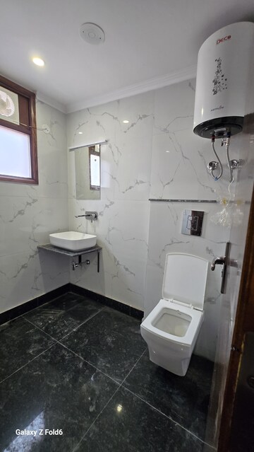 Bathroom in 2 BHK Builder Floor at Chattarpur – for Rent