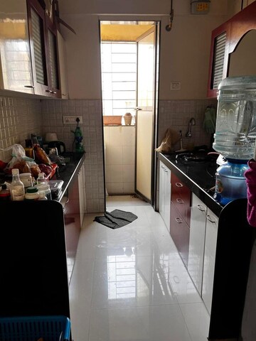 Kitchen in 1 BHK Apartment at Bhoomi Acres, Thane West – for Rent