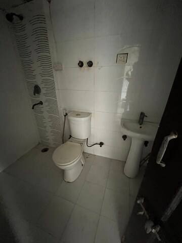 Bathroom in 2 BHK Apartment at Amrapali Zodiac, Sector 120 – for Rent