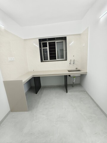 Kitchen in 2 BHK Apartment at Wadgaon Sheri – for Sale