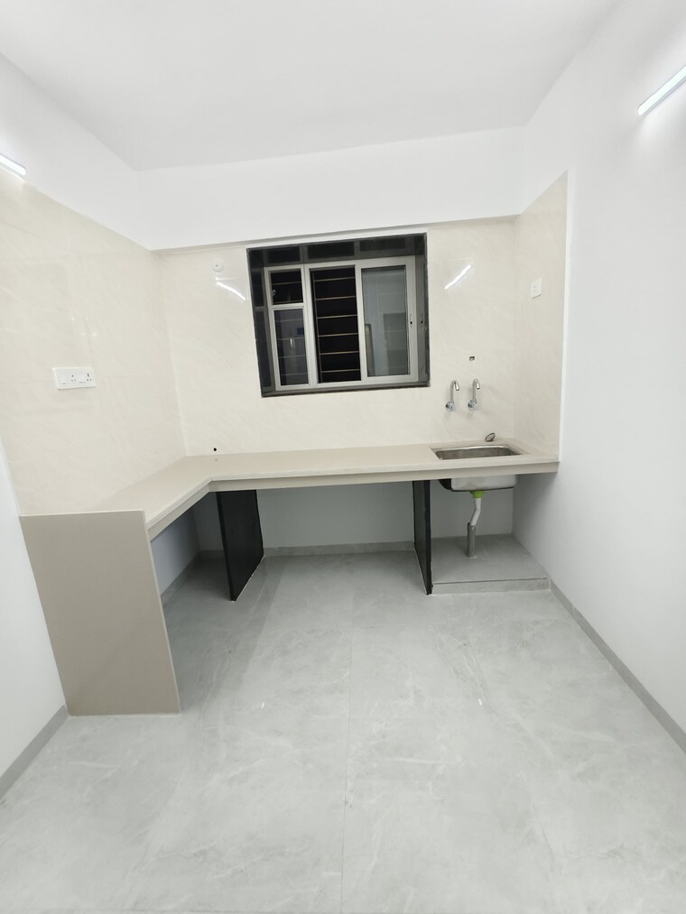 Kitchen, wadgaon sheri 2 Bedroom 955 Sq.Ft. Apartment In Wadgaon Sheri Pune 9608806